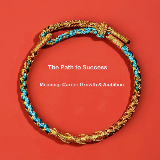 Bracelet with gold and blue braided design on a red background with text about career growth and ambition.