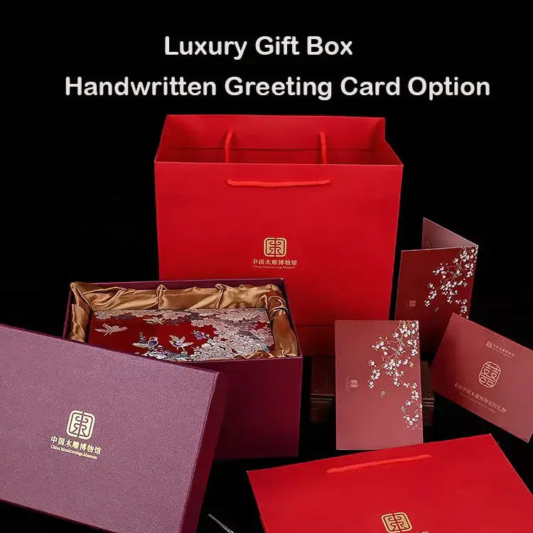 Collection of luxury gift boxes with a handwritten greeting card option on a black background