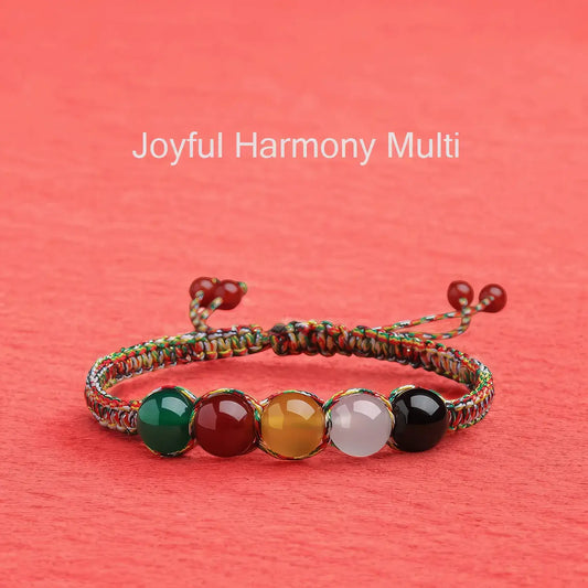 Multicolored beaded bracelet on a red background with 'Joyful Harmony Multi' text.