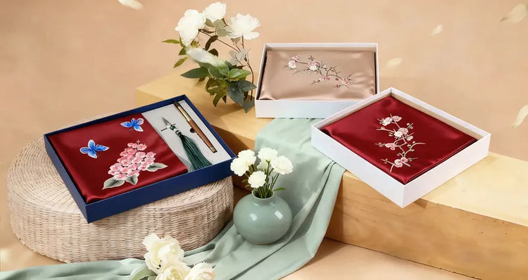 Artisan hands creating detailed Suzhou embroidery with silk threads in a traditional workshop, showcasing Chinese intangible cultural heritage.