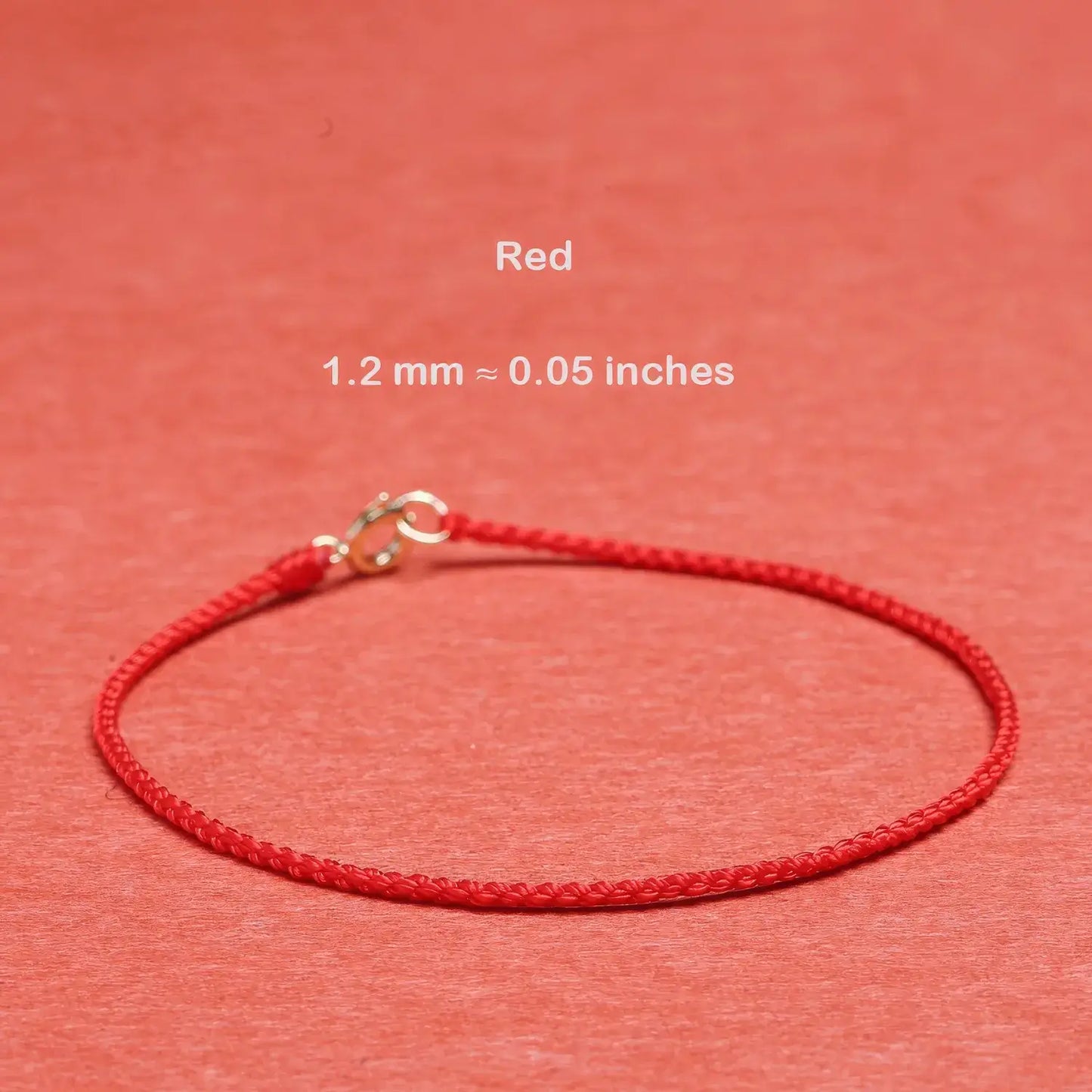 Red cord bracelet with measurement details on a red background