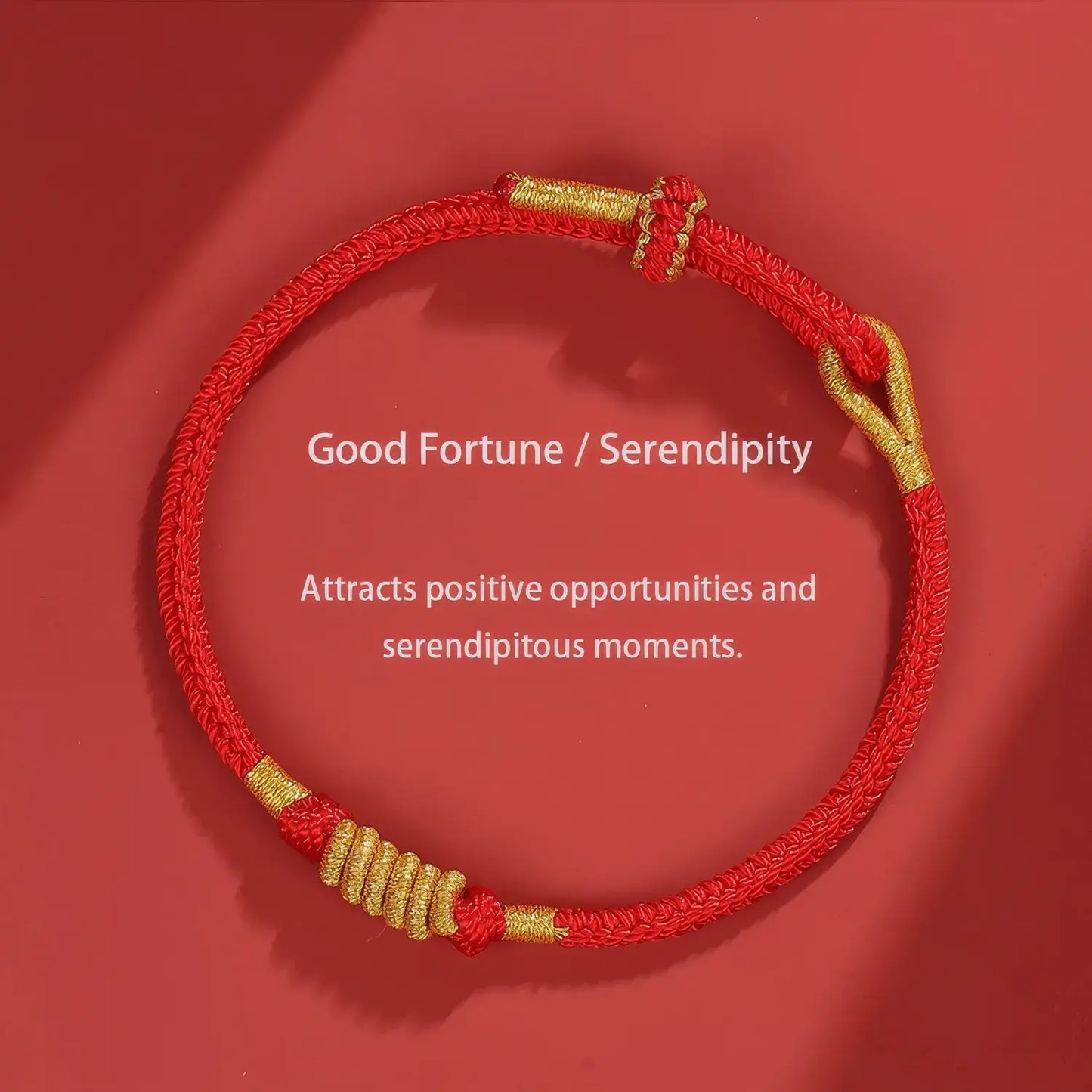 Red and gold bracelet on a red background with text about good fortune and serendipity.