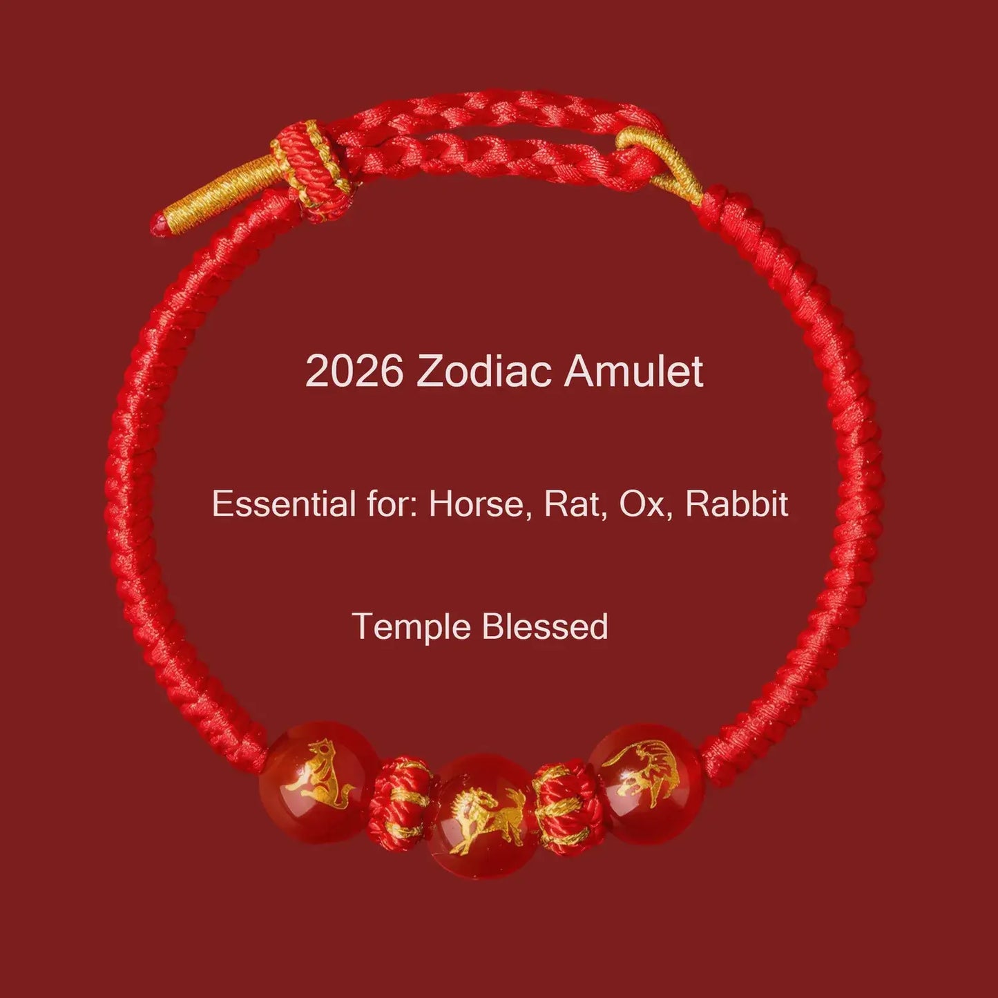 Red zodiac amulet bracelet with gold accents on a red background