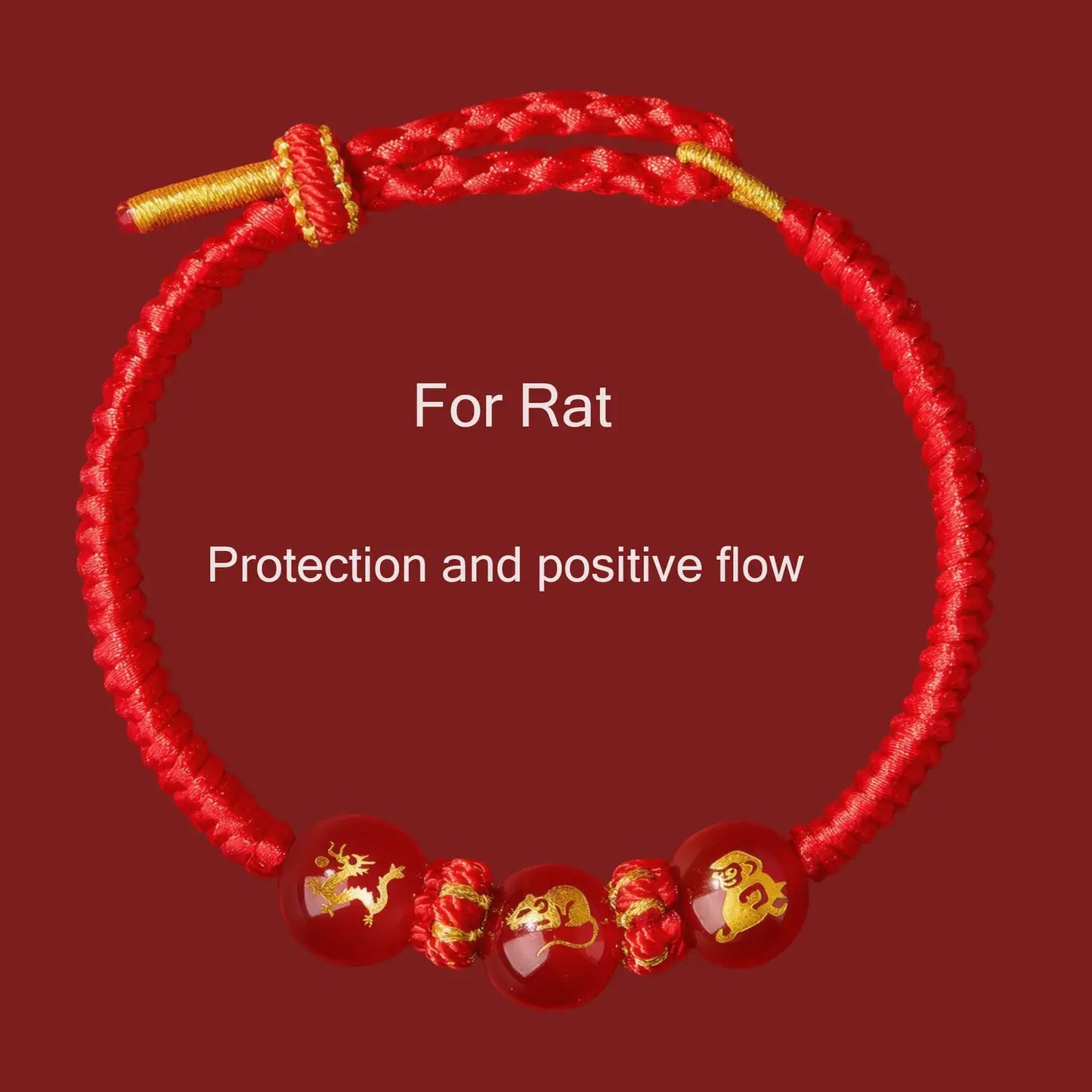 Red bracelet with gold accents and Chinese zodiac symbols on a red background
