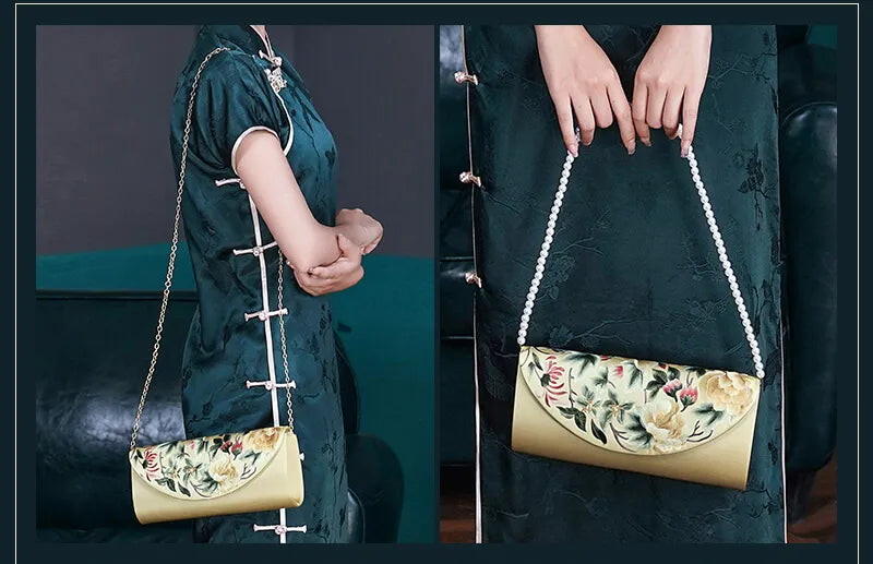 Woman holding a floral-patterned handbag with a plain background