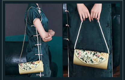 Woman holding a floral-patterned handbag with a plain background