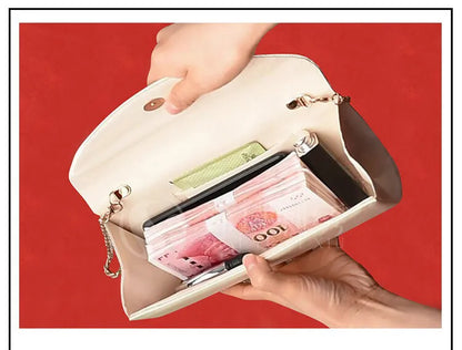 Beige wallet with money against a red background
