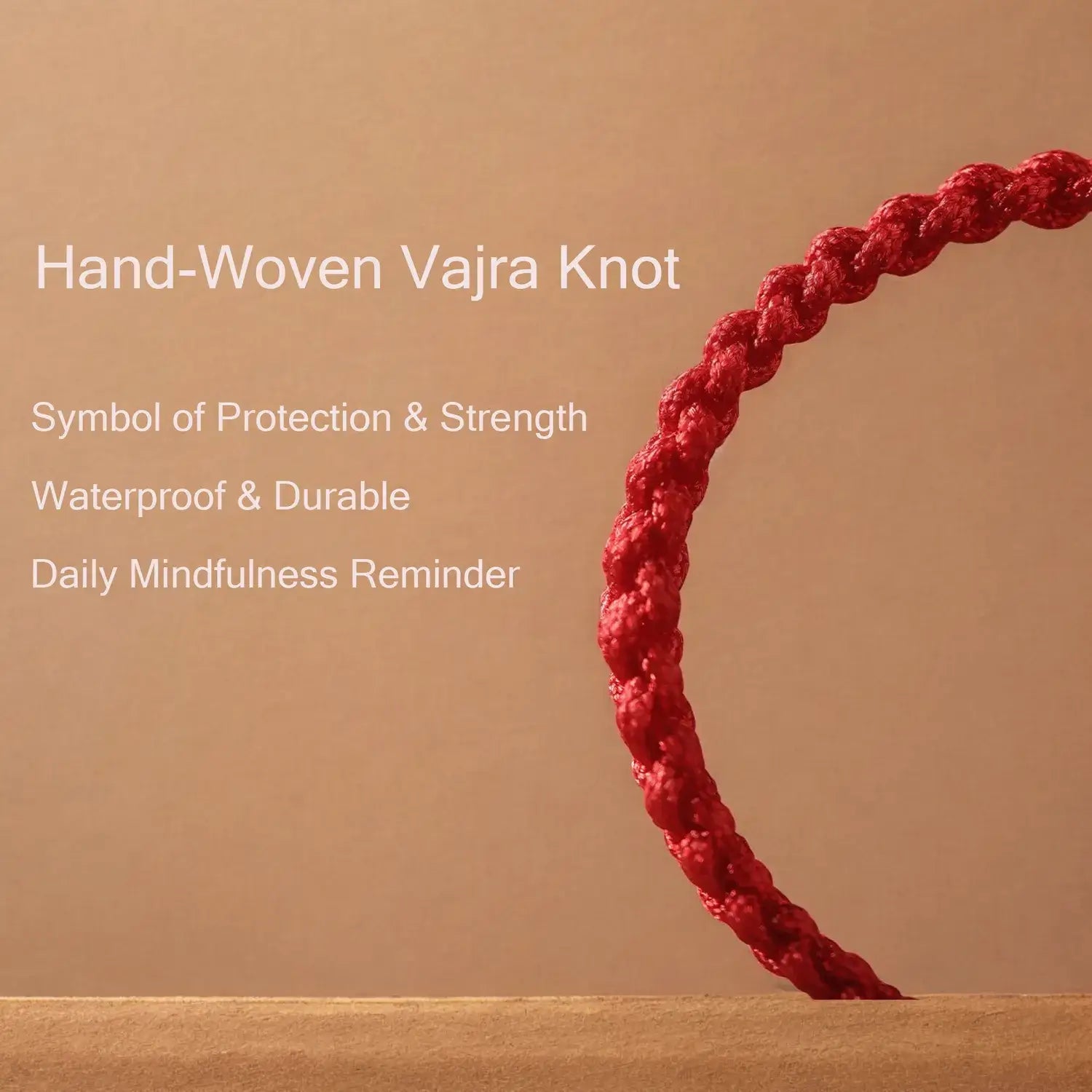 Red hand-woven vajra knot on a beige background with text about its properties.