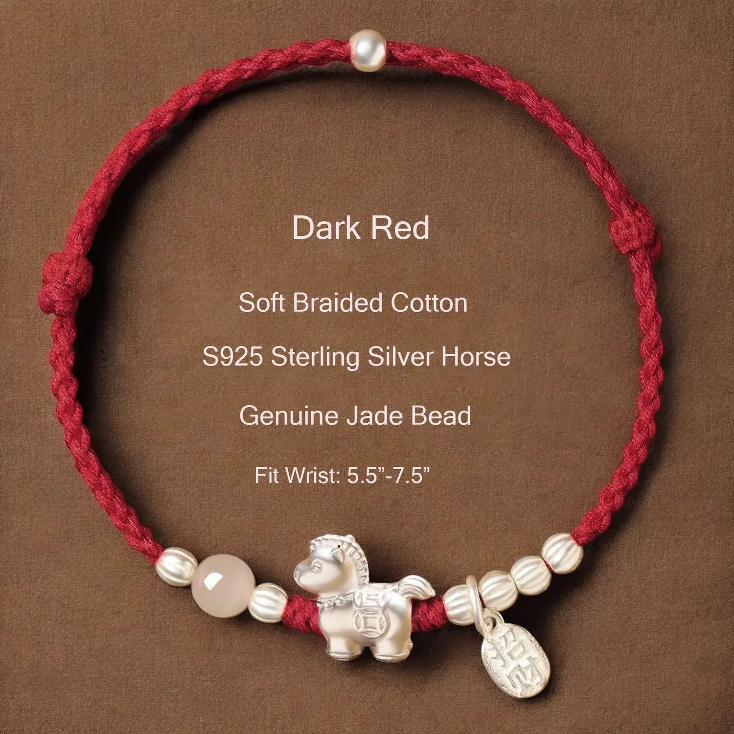 Dark red braided cotton bracelet with silver horse charm and jade bead on a brown background