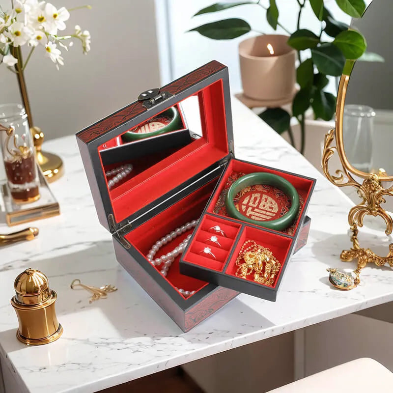 Jewelry box with jewelry on a marble surface