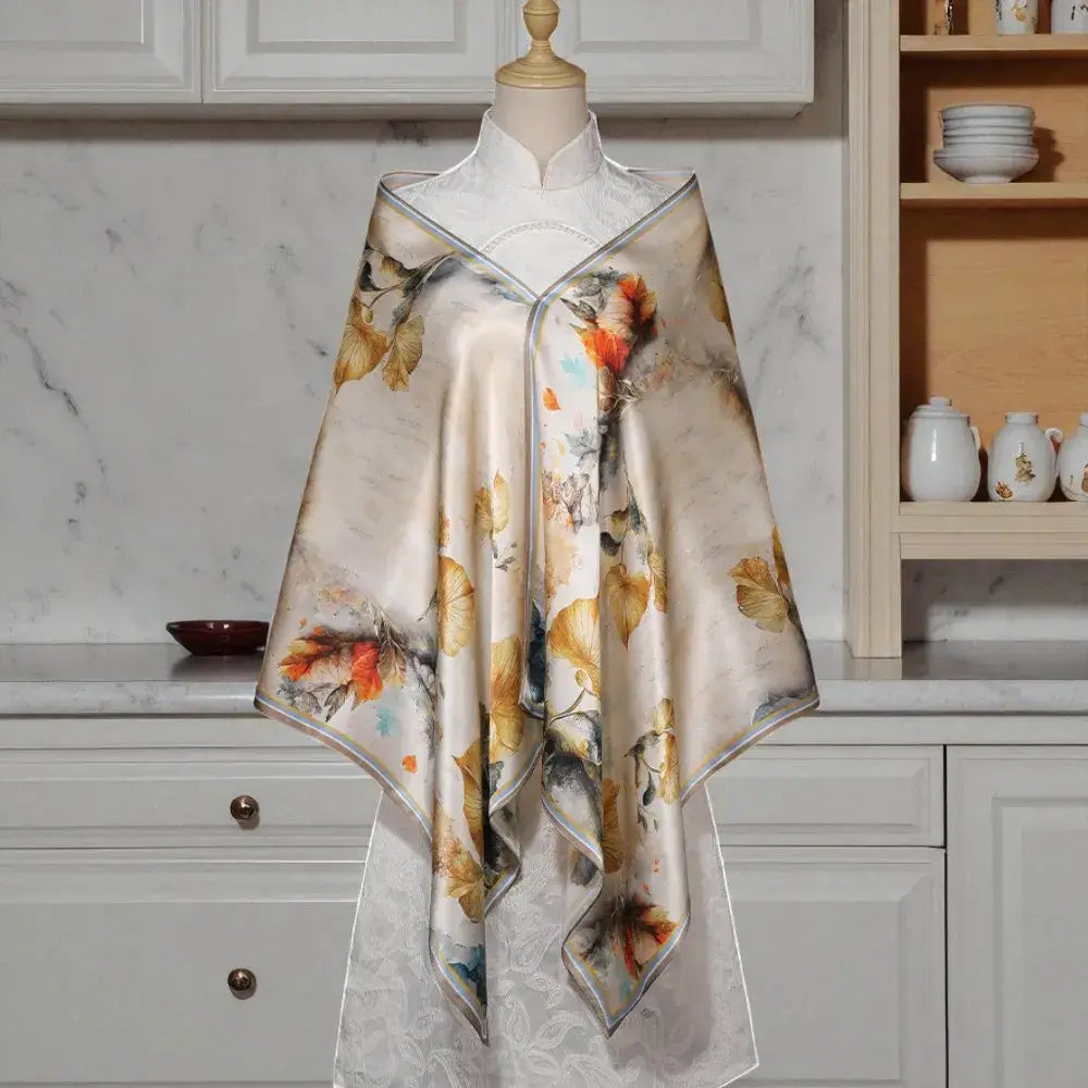 Silk scarf with floral design on a mannequin in a kitchen setting