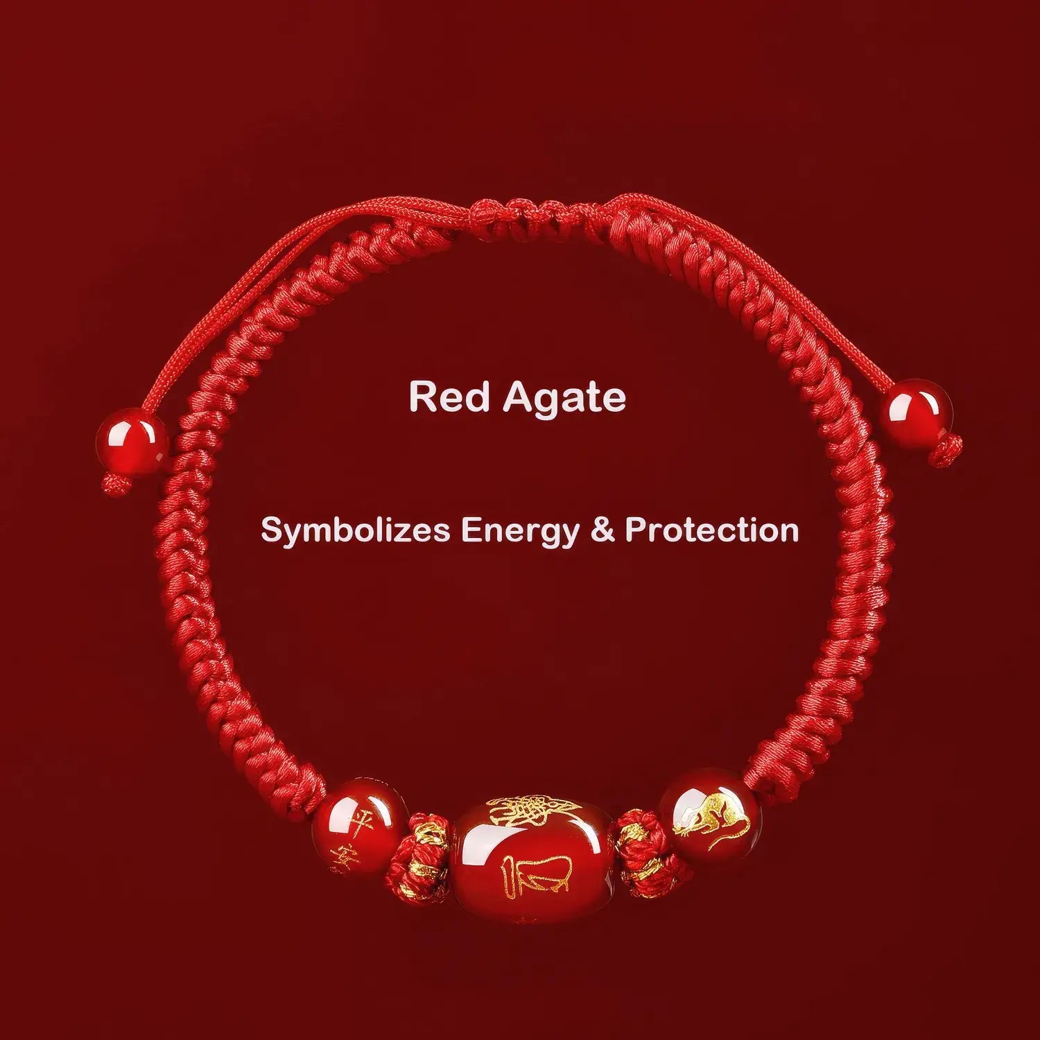 Red agate bracelet with symbolic beads on a red background