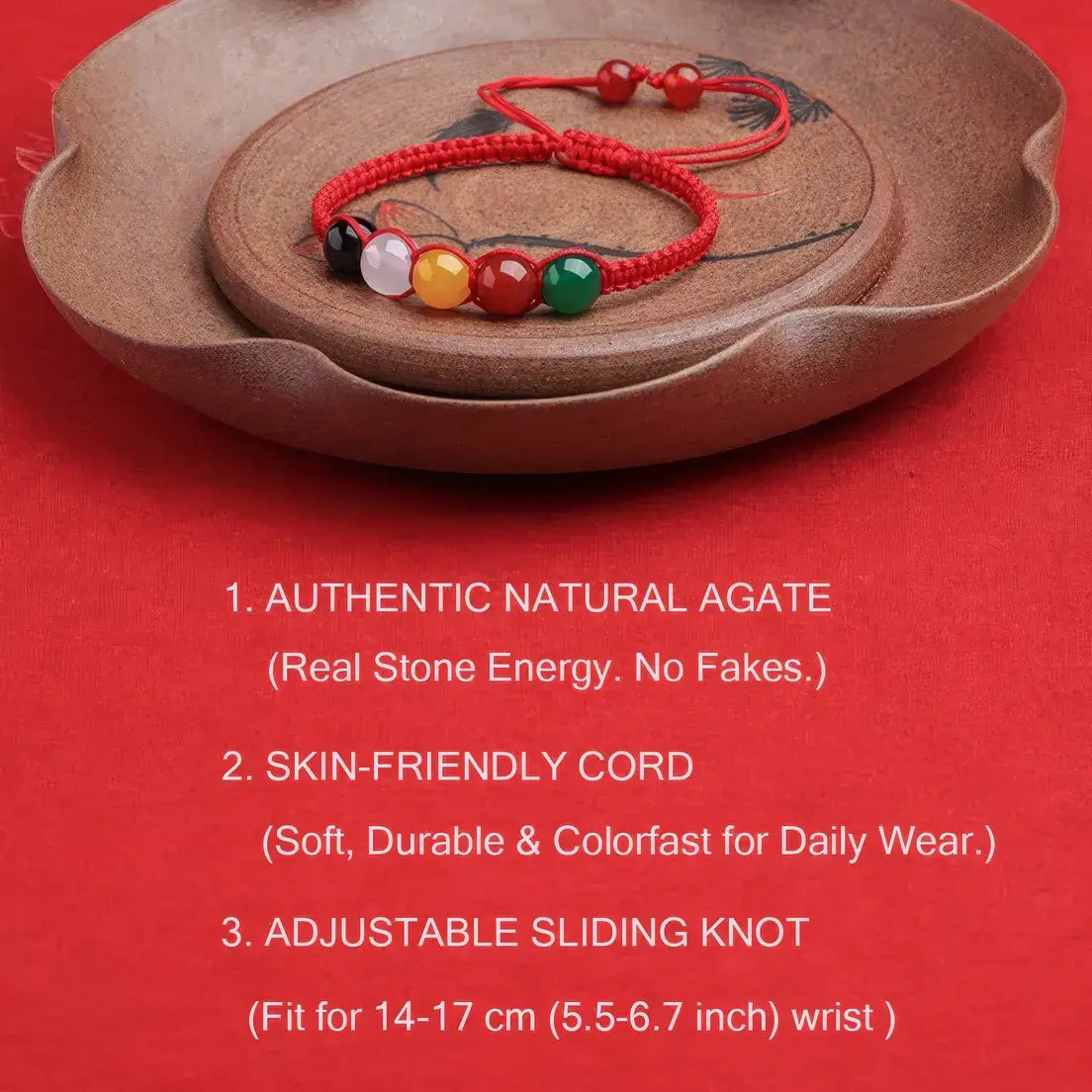 Red agate bracelet on a wooden dish with product features listed on a red background