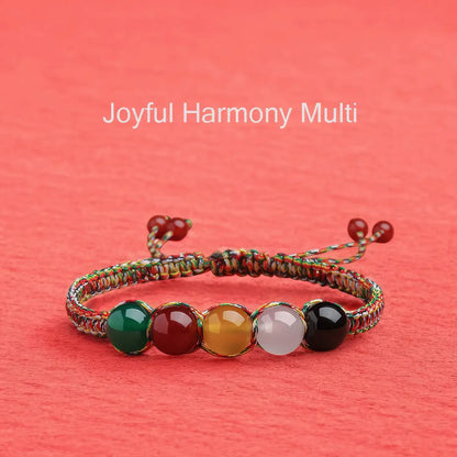 Multicolored beaded bracelet on a red background with 'Joyful Harmony Multi' text.