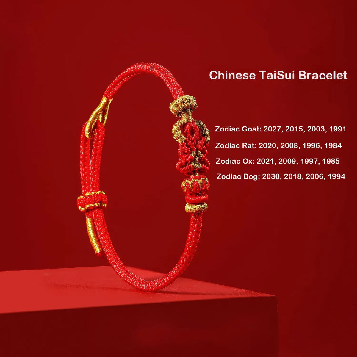 A red Chinese TaiSui bracelet with gold-toned metal clasp and decorative knotwork, displayed on a red pedestal against a red background. White text on the right lists zodiac years associated with the bracelet.