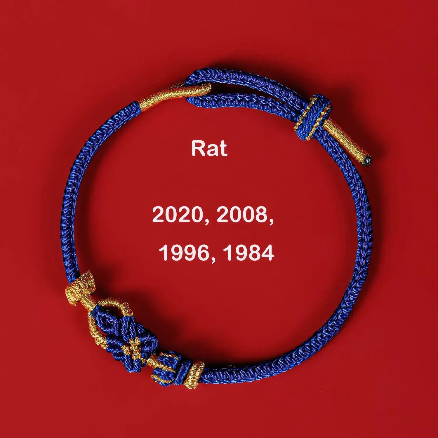 Blue and gold bracelet on a red background with 'Rat' and years displayed.