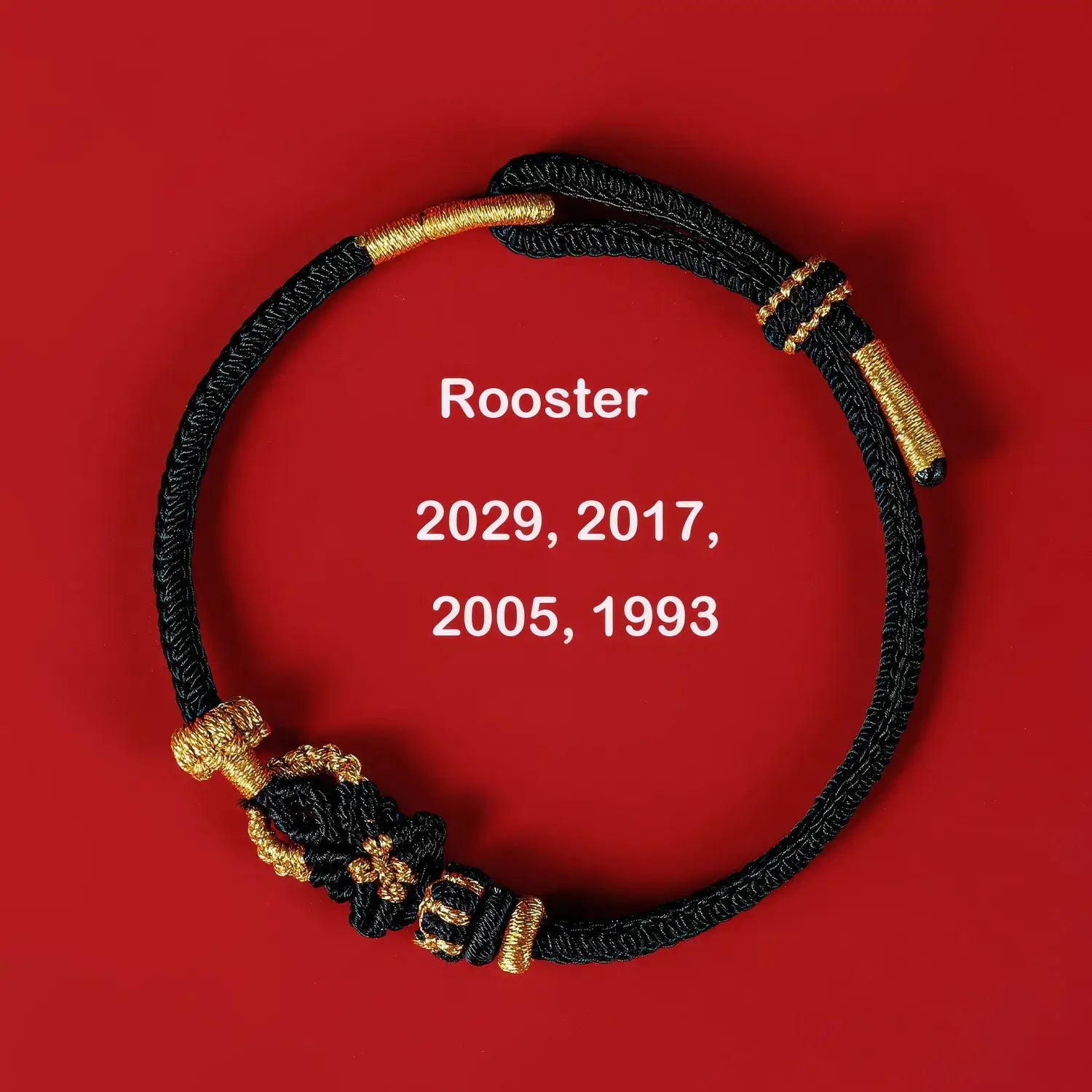Black and gold bracelet on a red background with 'Rooster' and years displayed.