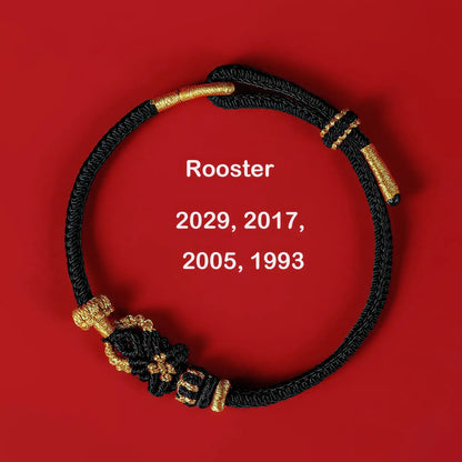 Black and gold bracelet on a red background with 'Rooster' and years displayed.