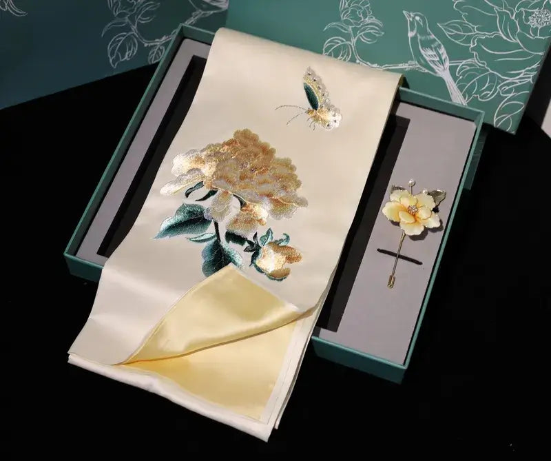 Embroidered scarf with floral design and brooch in a box