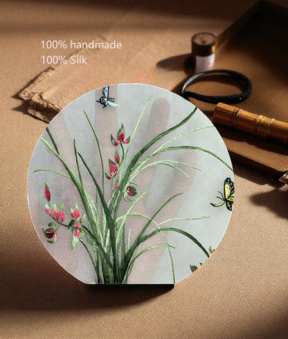 Silk fabric with floral design on a textured surface