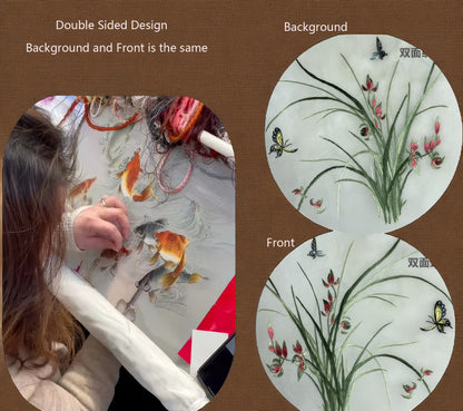 Product with double-sided design showing fish and floral patterns, used by a person.