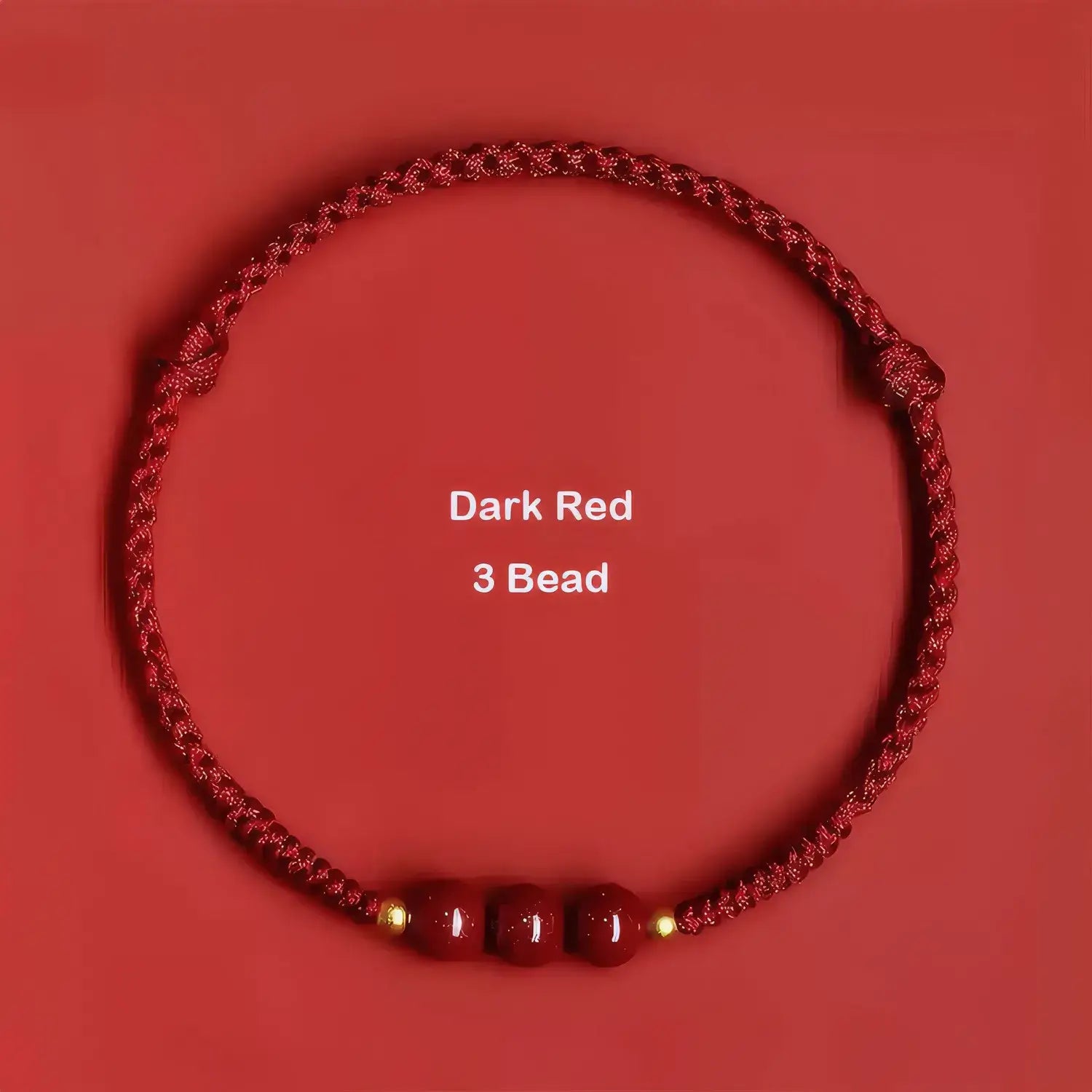 Dark red braided necklace with three beads on a red background