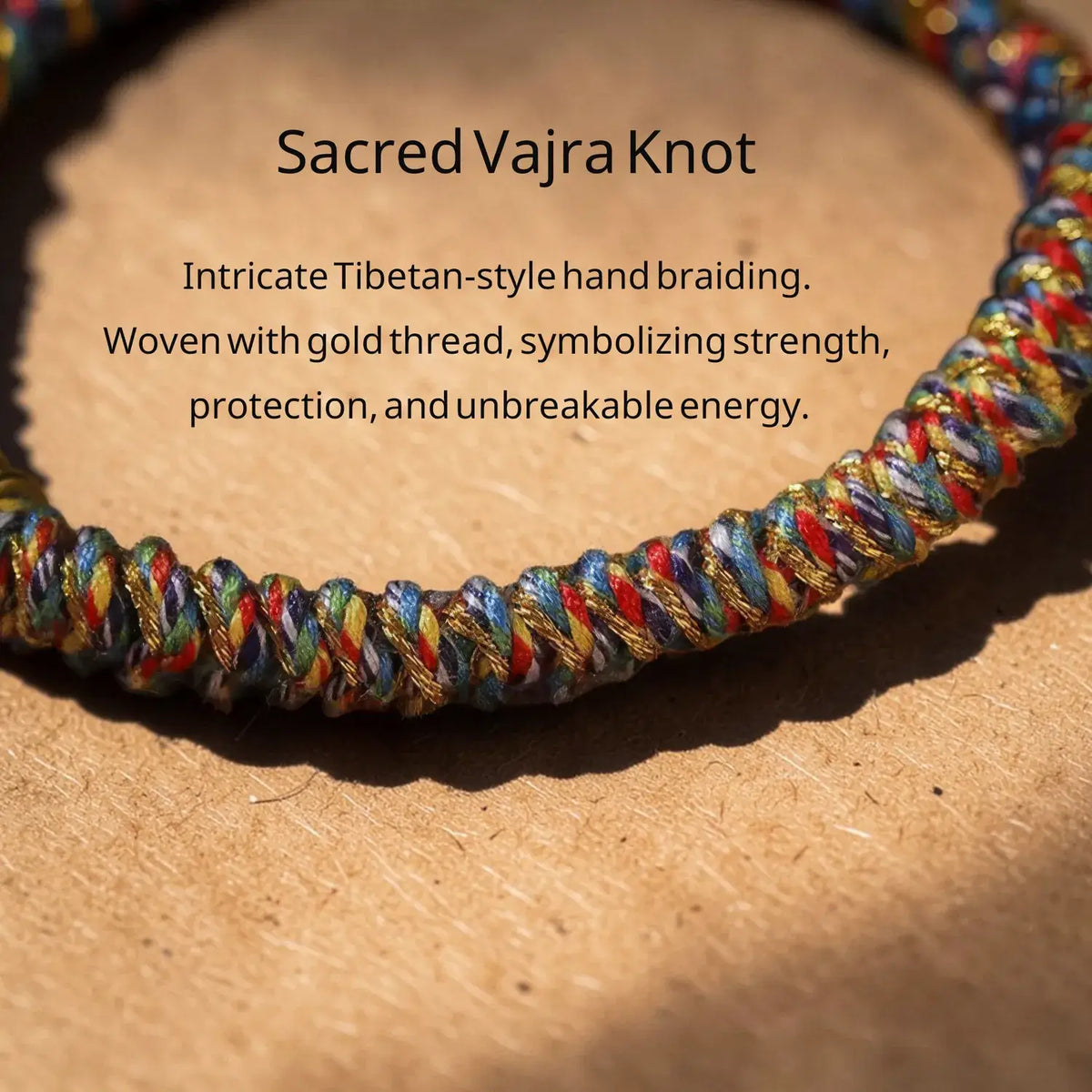 Colorful Sacred Vajra Knot bracelet on a wooden surface with descriptive text.