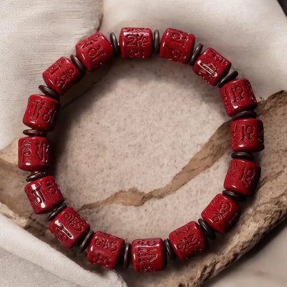 Rotating Cinnabar Prayer Wheel Bracelet