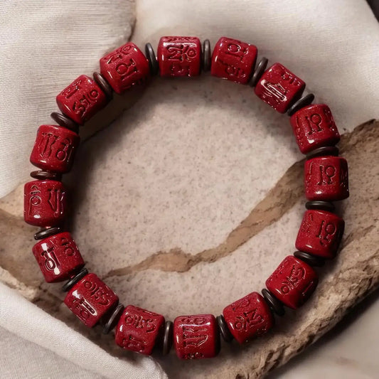 Rotating Cinnabar Prayer Wheel Bracelet