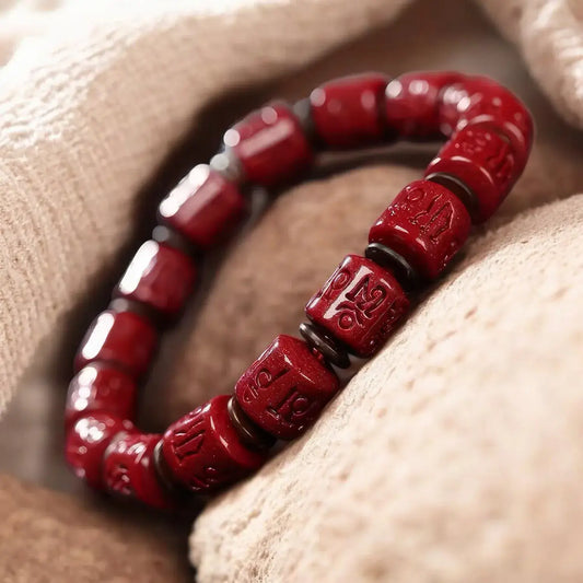 Rotating Cinnabar Prayer Wheel Bracelet