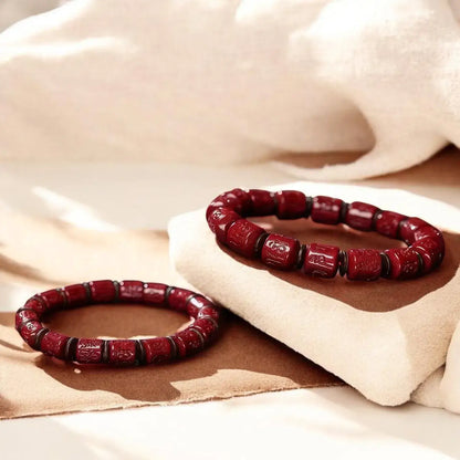 Rotating Cinnabar Prayer Wheel Bracelet