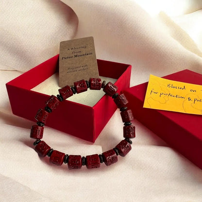 Rotating Cinnabar Prayer Wheel Bracelet
