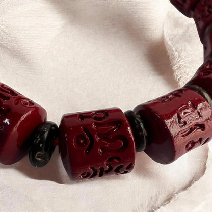 Rotating Cinnabar Prayer Wheel Bracelet