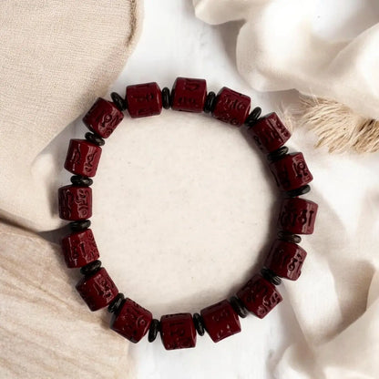 Rotating Cinnabar Prayer Wheel Bracelet