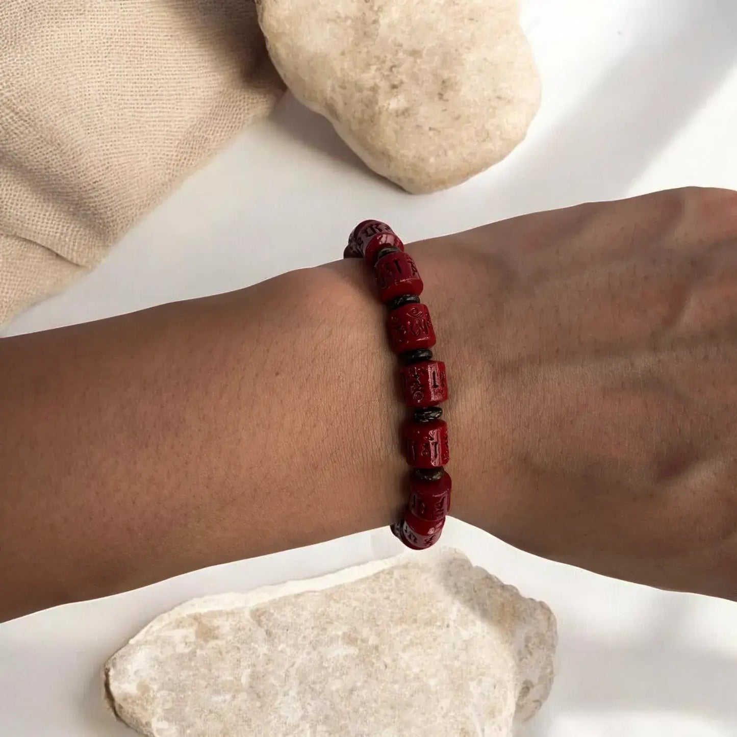 Rotating Cinnabar Prayer Wheel Bracelet
