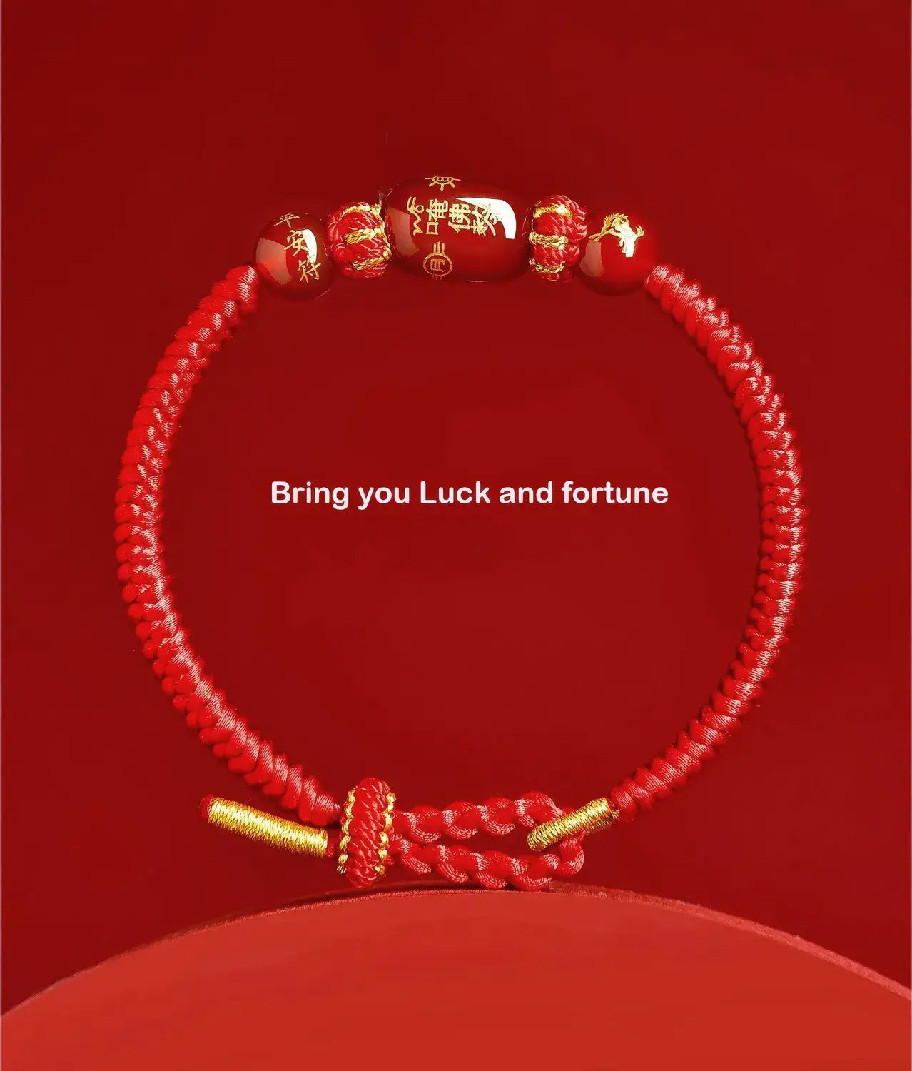 Red braided bracelet with gold accents on a red background, featuring text 'Bring you Luck and fortune'.