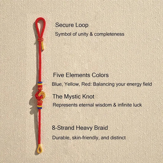 Red bracelet with mystical knot on a beige background