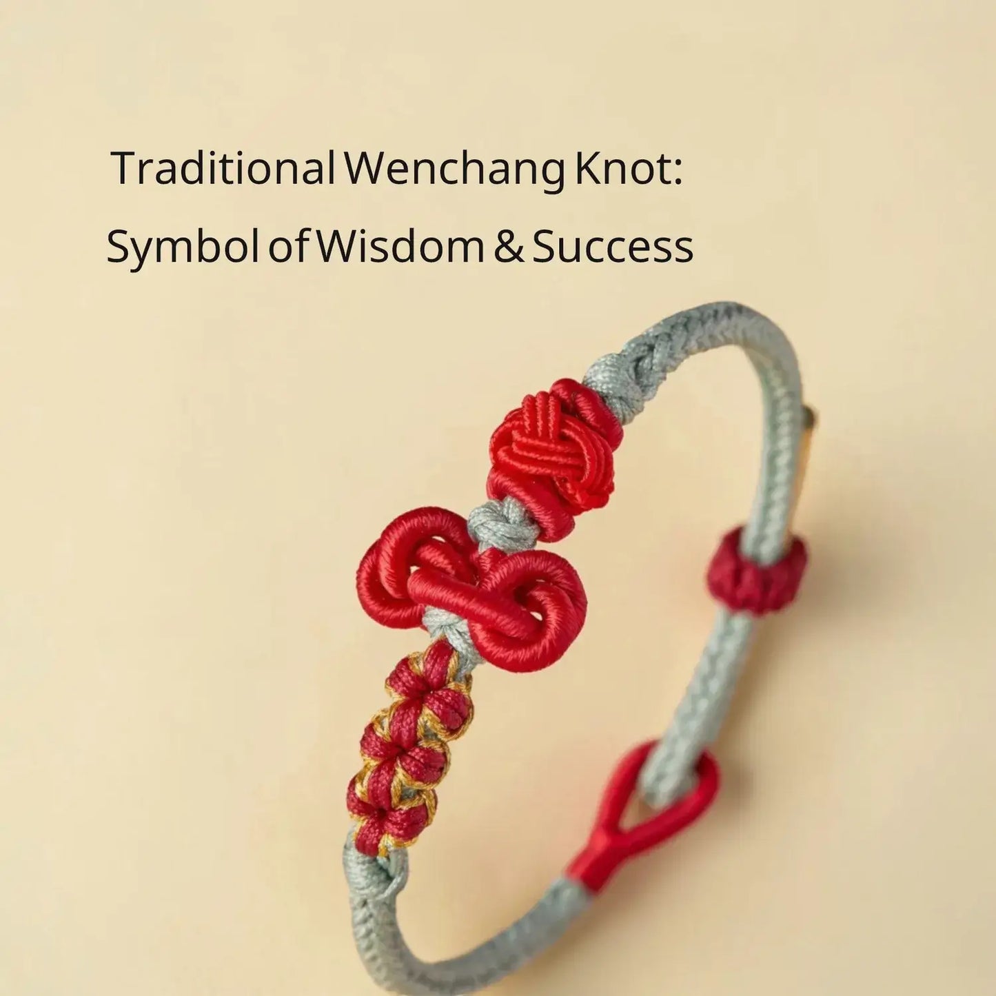 Traditional Wenchang knot bracelet with red and gray strings on a beige background